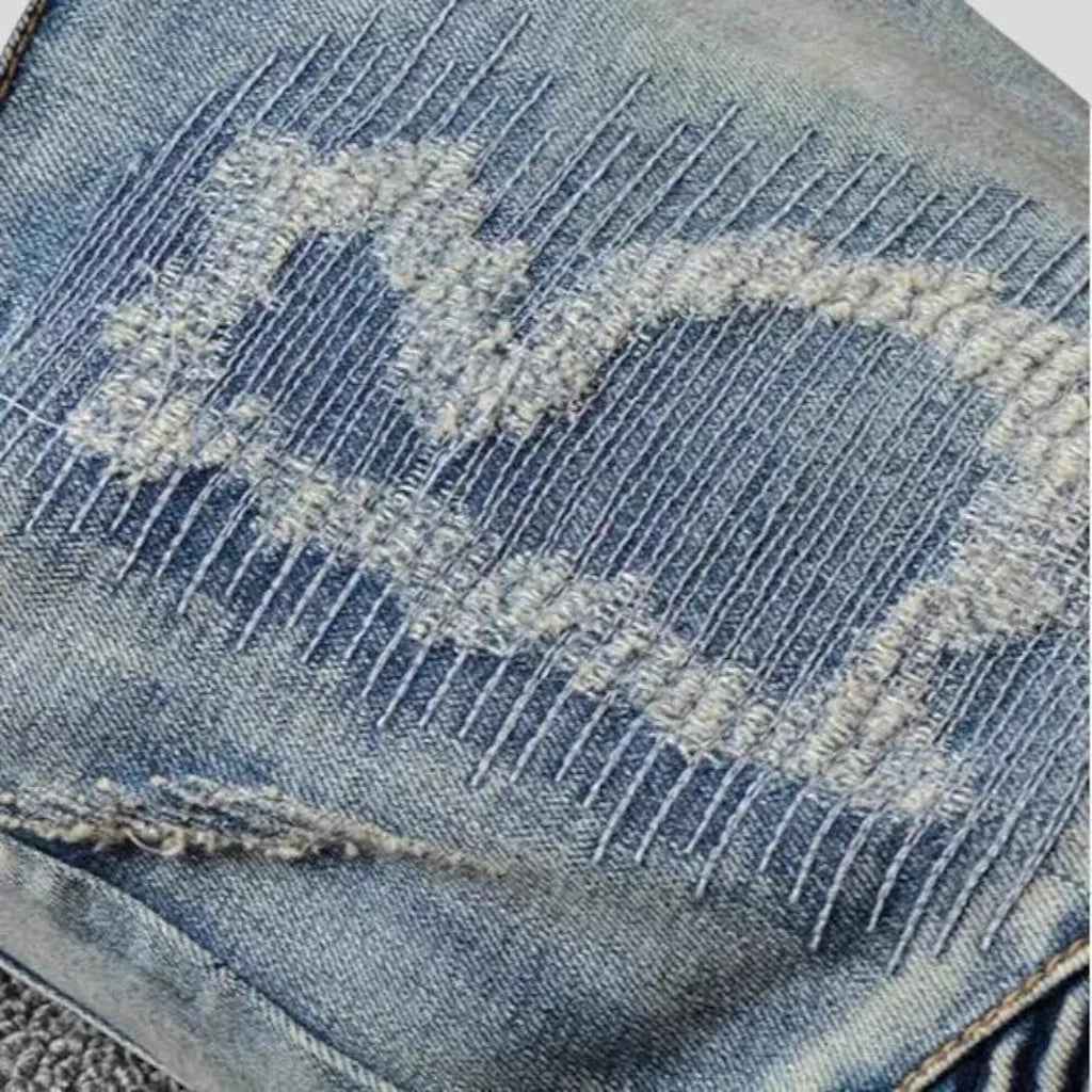 Vintage distressed men's moto jeans