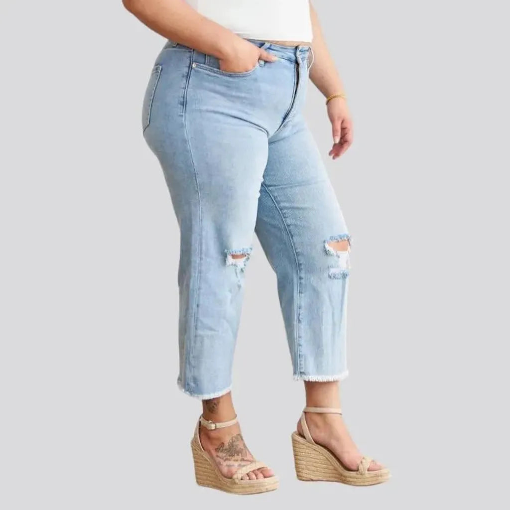 Distressed women's raw-hem jeans