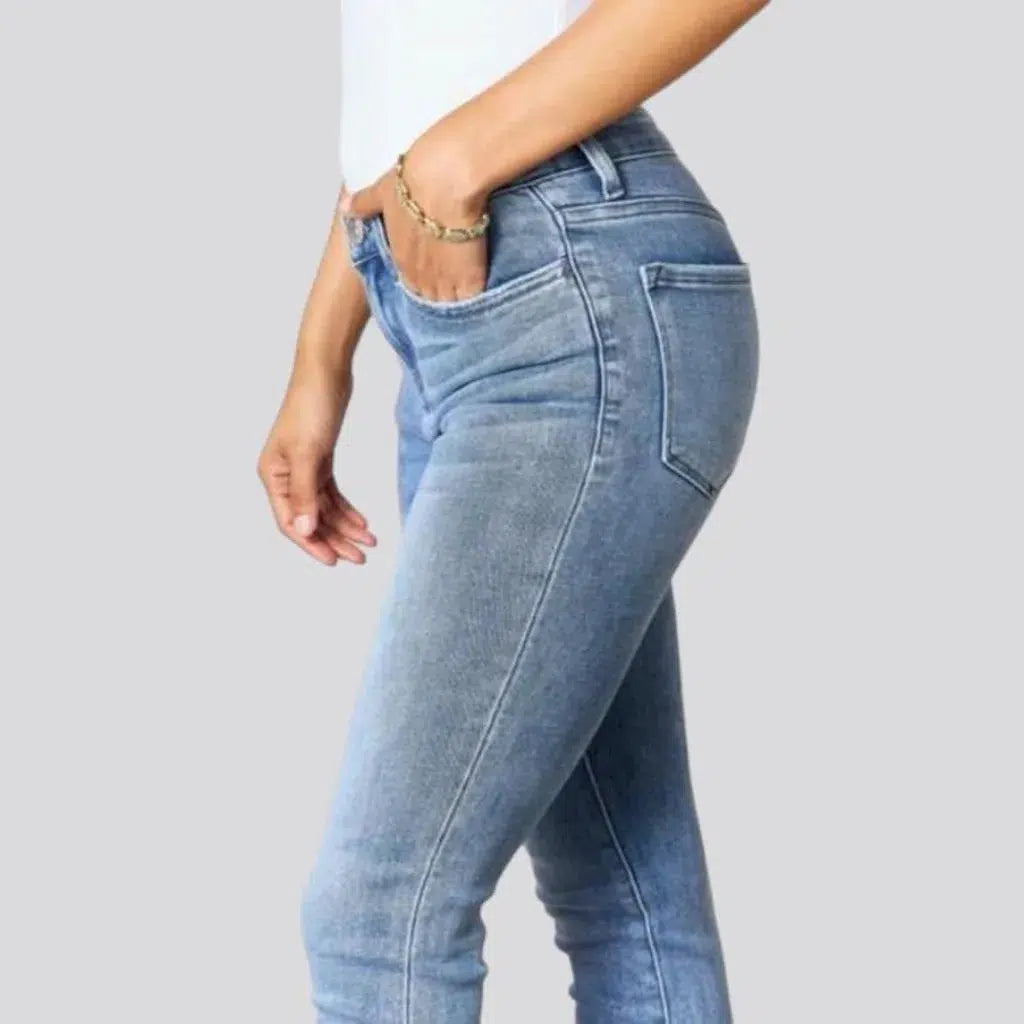 Light-wash sanded jeans
 for ladies
