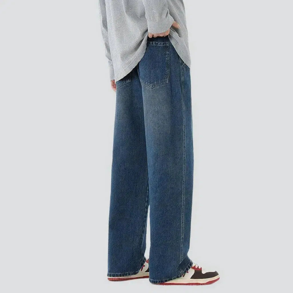 Elevated men's waistline jeans