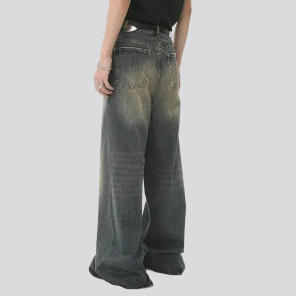 Baggy men's aged jeans