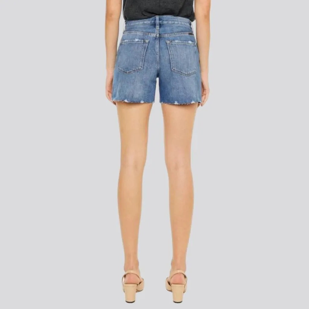 Medium-wash whiskered jeans shorts for women