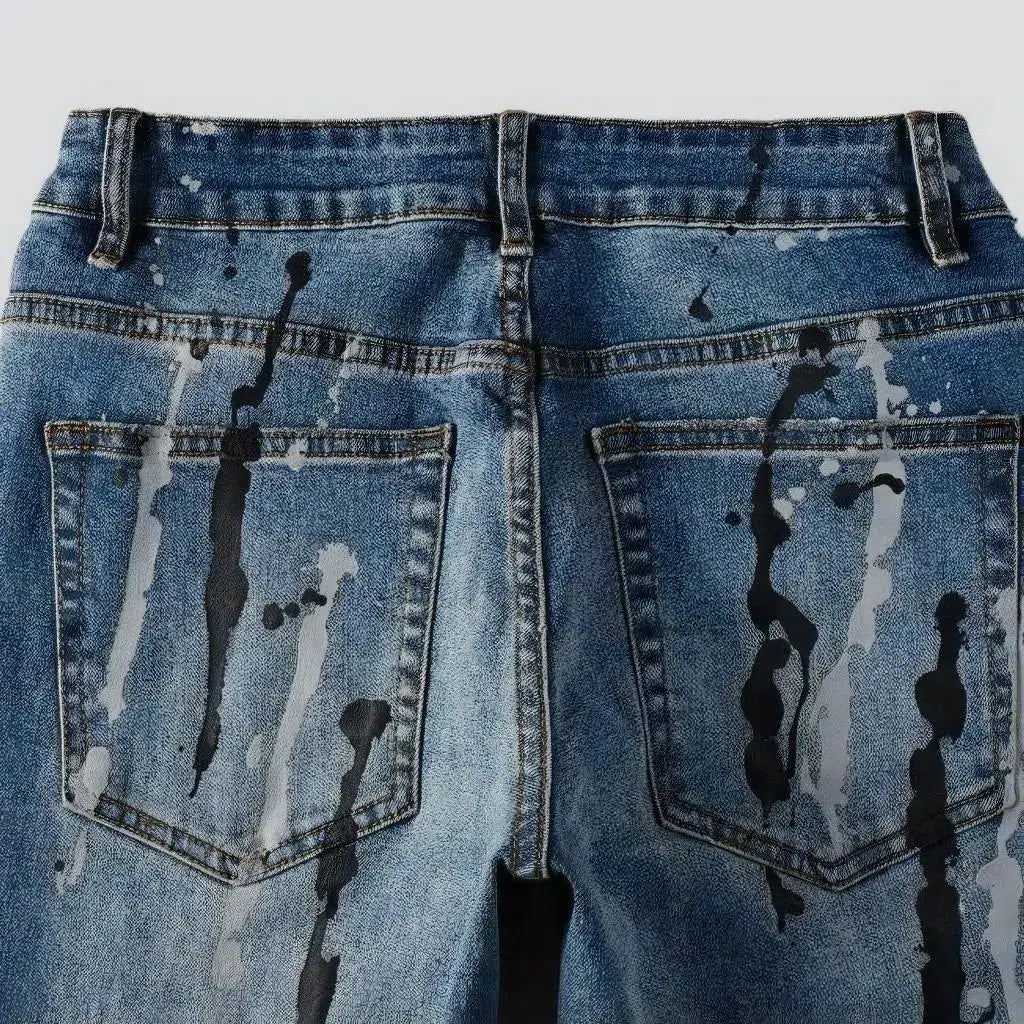 Painted men's light-wash jeans