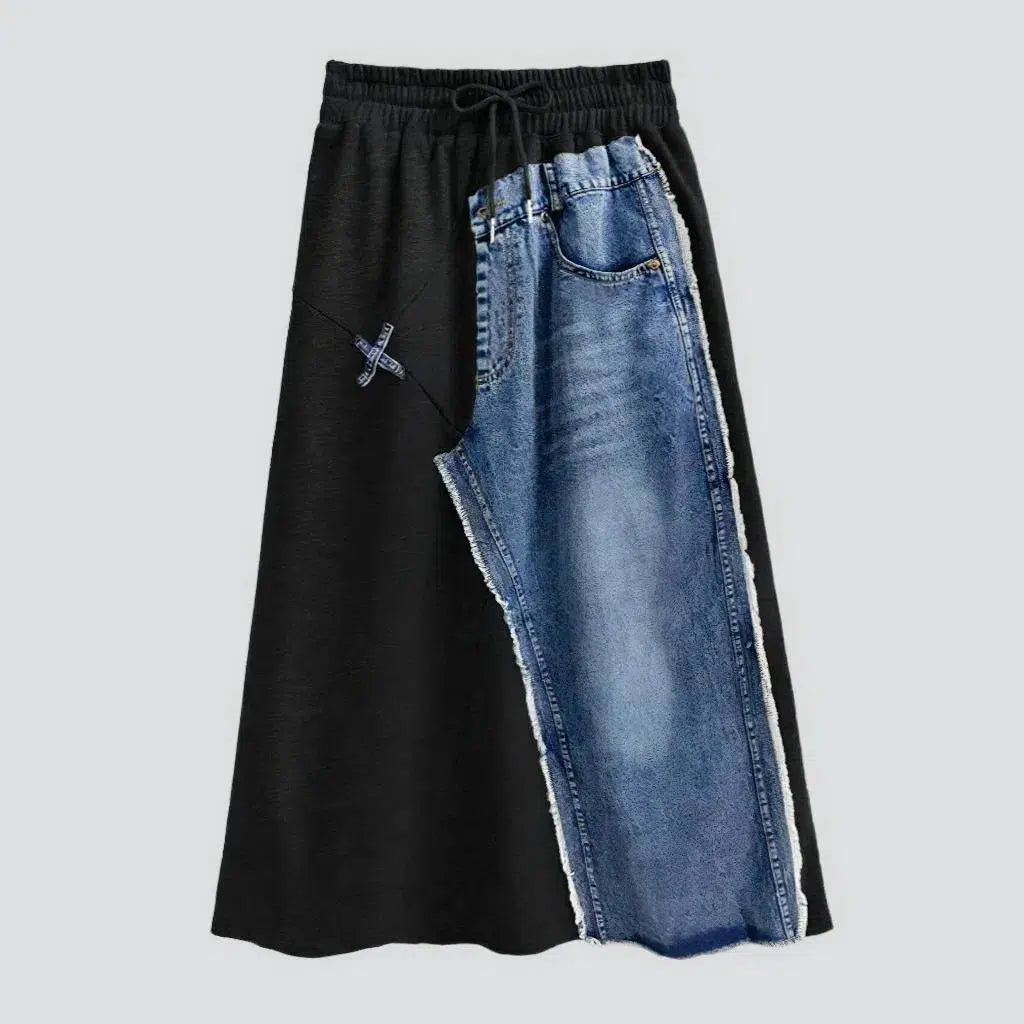 Raw hem whiskered denim skirt