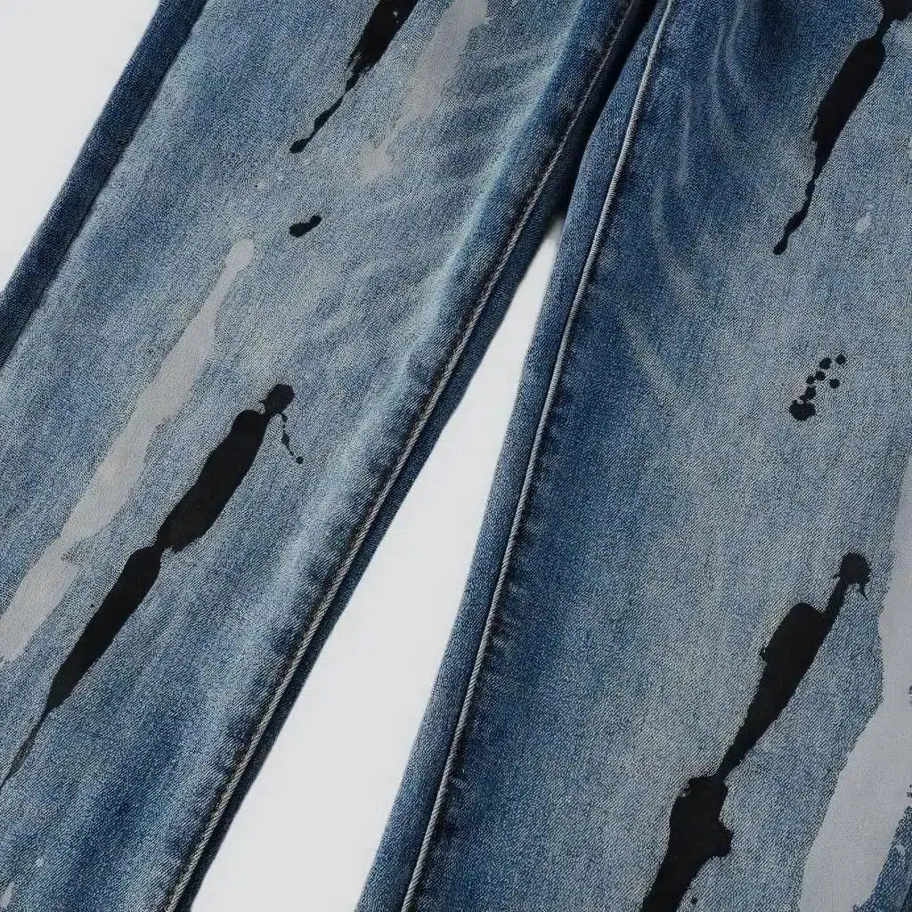 Painted men's light-wash jeans