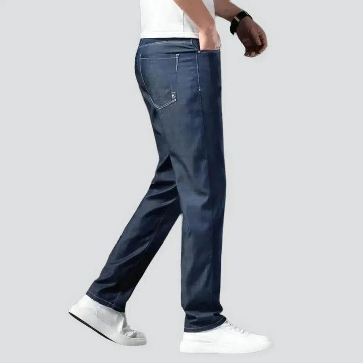 Dark men's tapered jeans