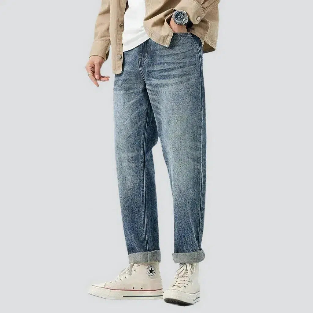 Medium-wash men's fashion jeans