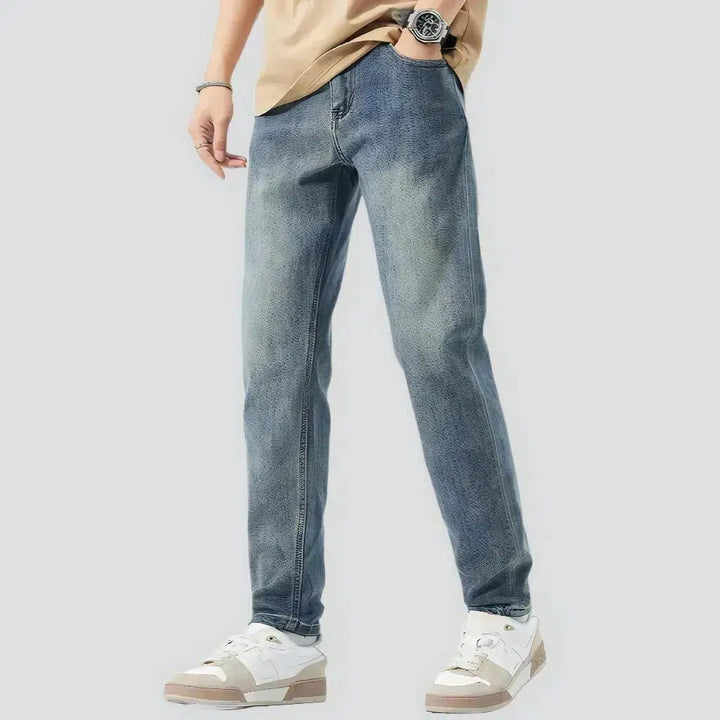 High-waist men's light-wash jeans