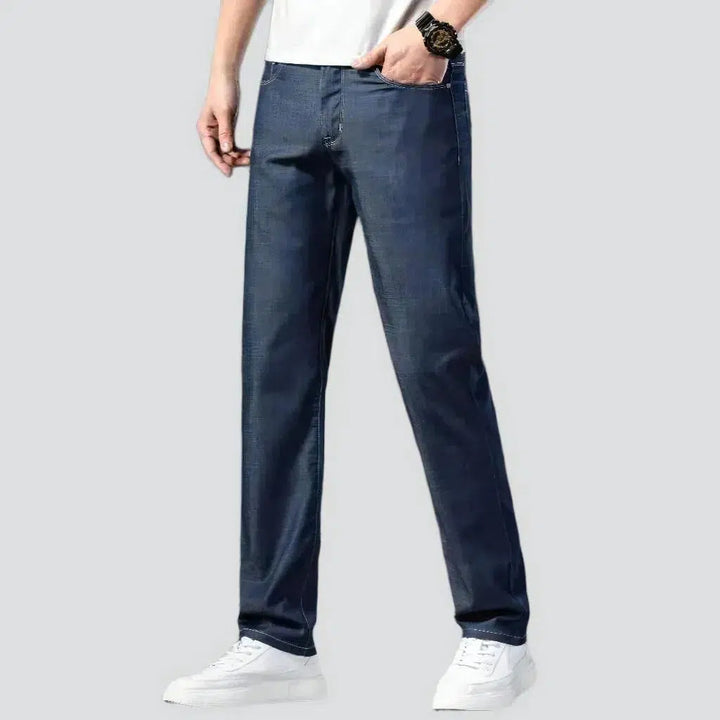 Dark men's tapered jeans