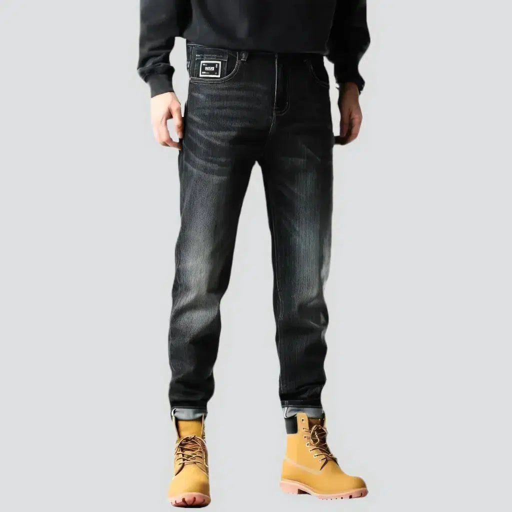 Black men's tapered jeans