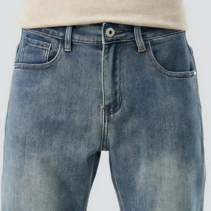 High-waist men's light-wash jeans