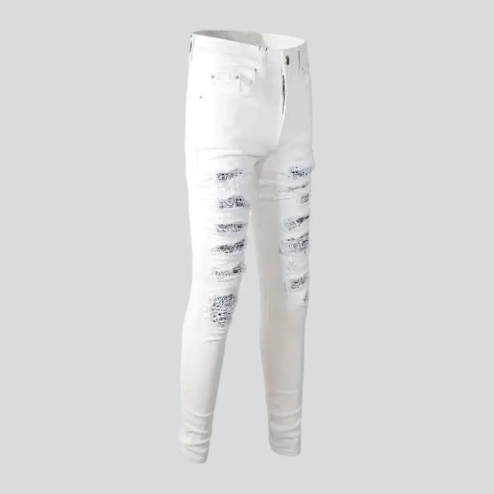 Distressed painted-patches jeans for men