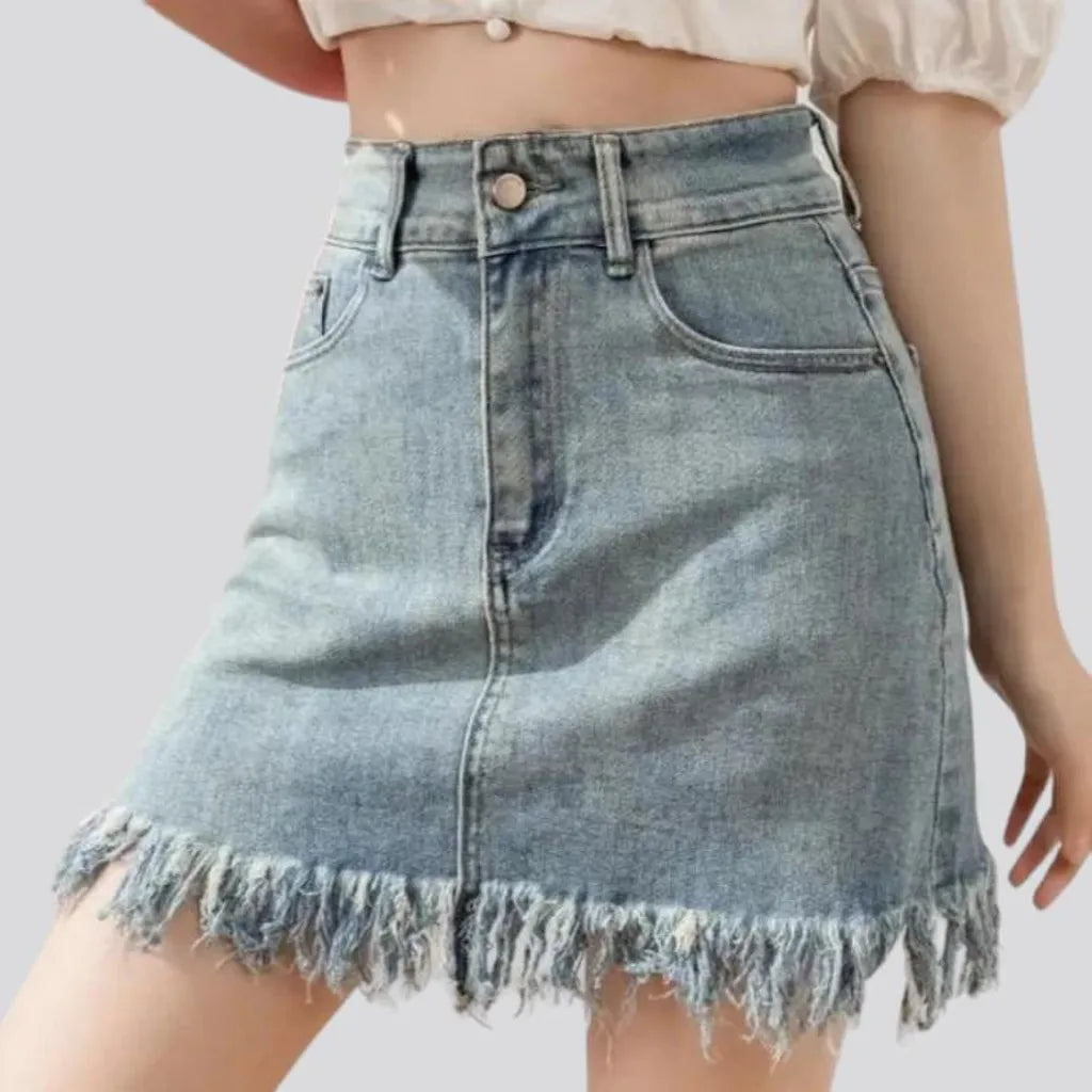 Fringe-hem light-wash denim skort