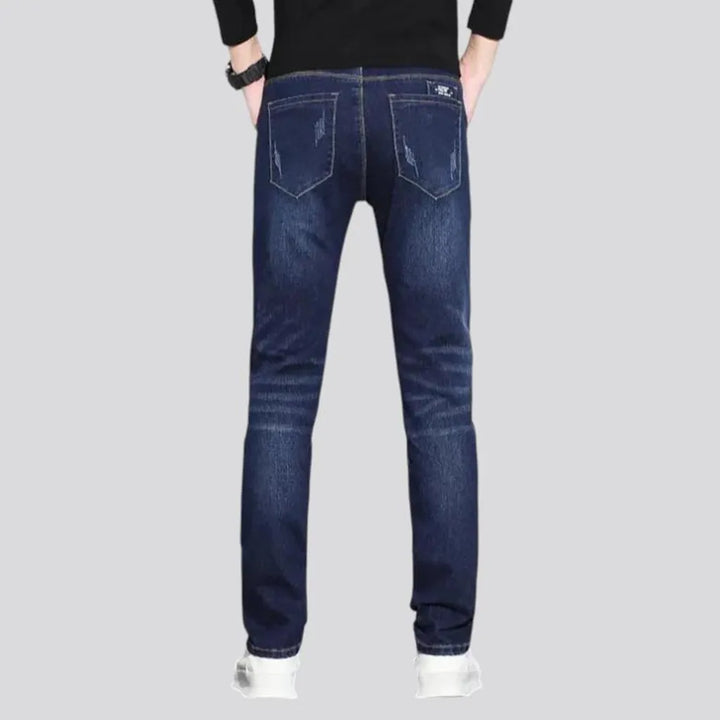 Dark abraded slim fit men's jeans