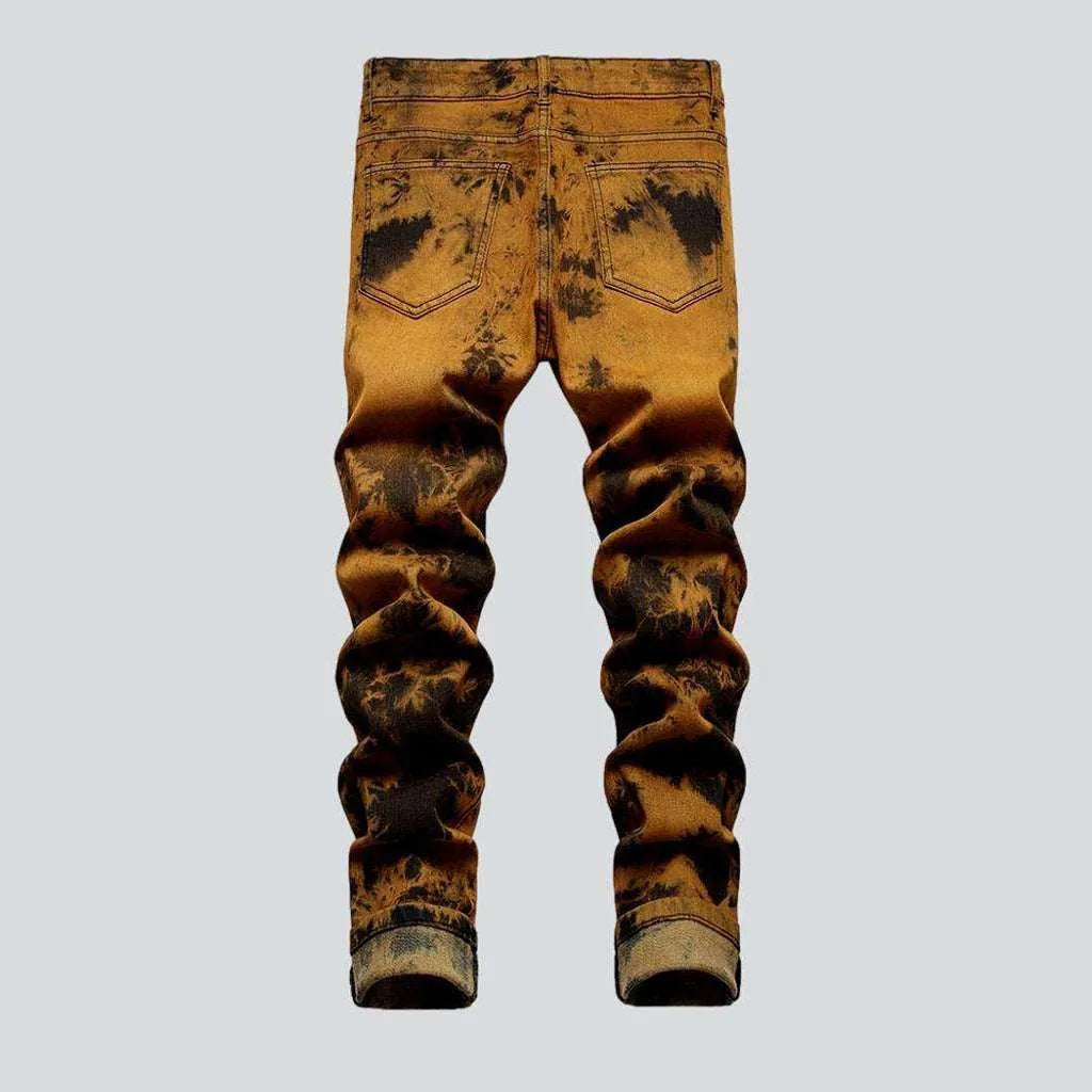 Orange over-dyed men's jeans