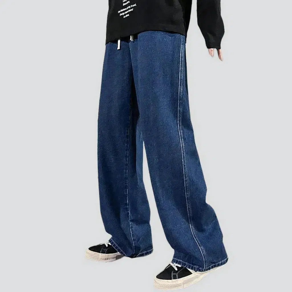 Baggy men's floor-length jeans