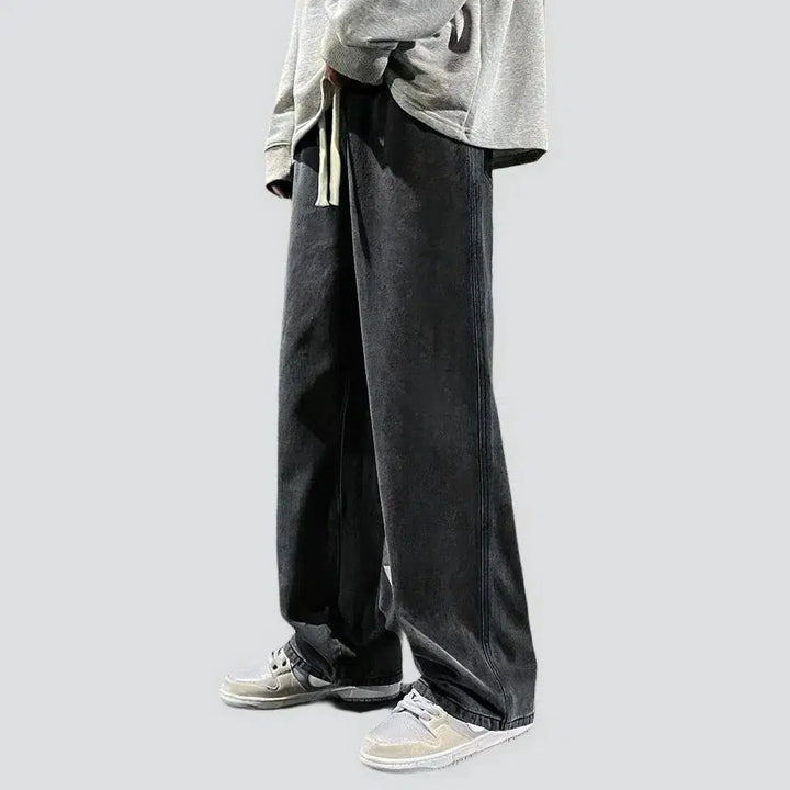 Baggy men's floor-length jeans