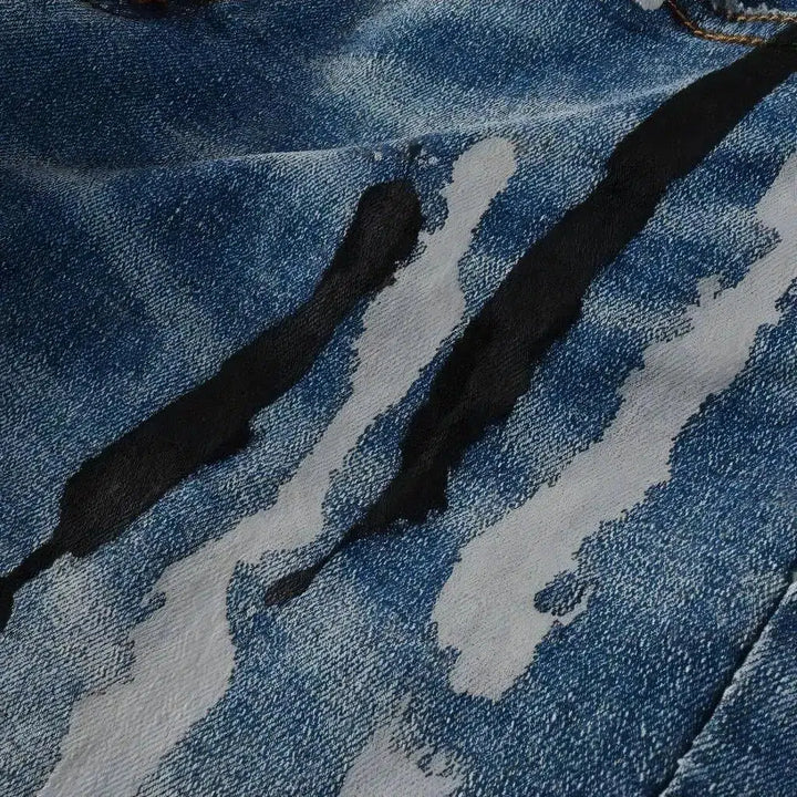 Painted men's light-wash jeans