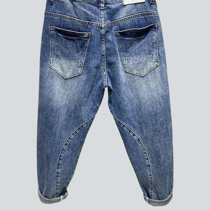 Ripped light blue men's jeans