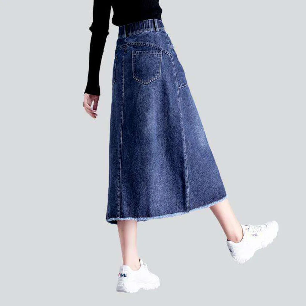 Asymmetric hem whiskered denim skirt