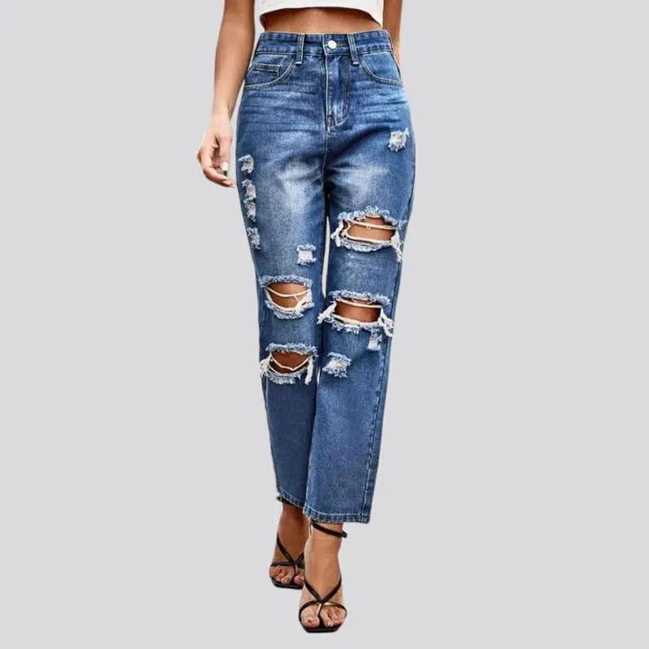 Grunge women's medium-wash jeans