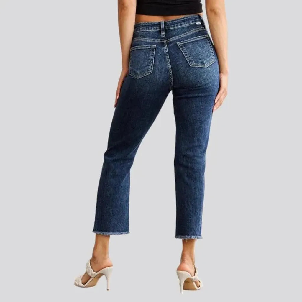 Frayed women's high-waist jeans