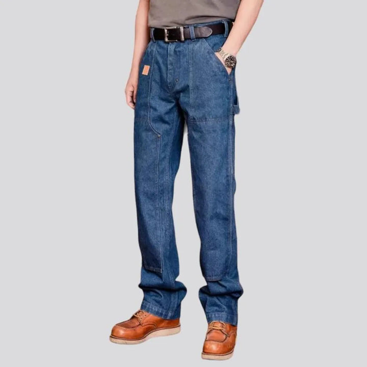 Straight medium-wash work jeans
 for men