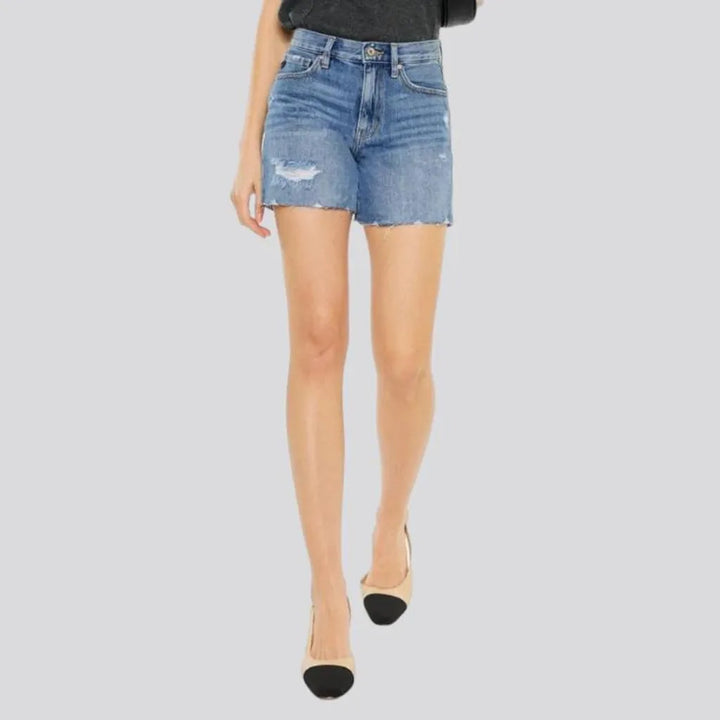 Medium-wash whiskered jeans shorts for women