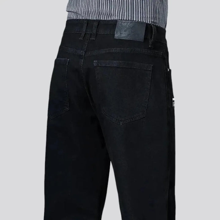 High-rise tapered jeans for men