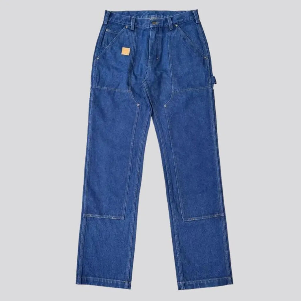 Straight medium-wash work jeans
 for men