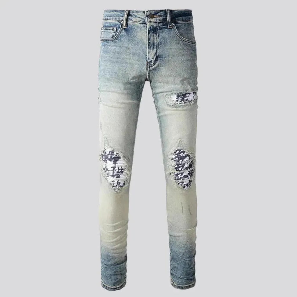 Aged men's whiskered jeans