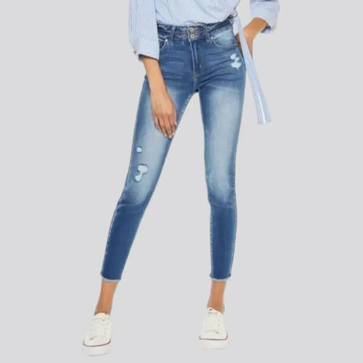 Cutoff-bottoms distressed jeans
 for women