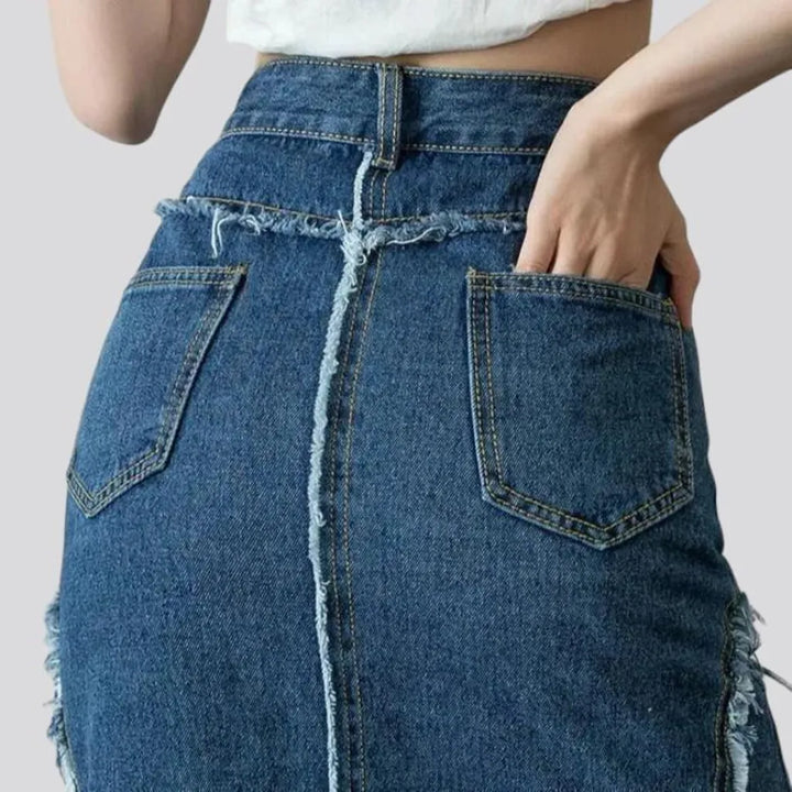 Distressed women's jean skirt