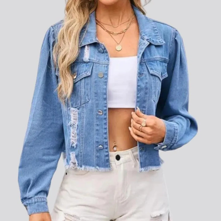 Light-wash distressed denim jacket