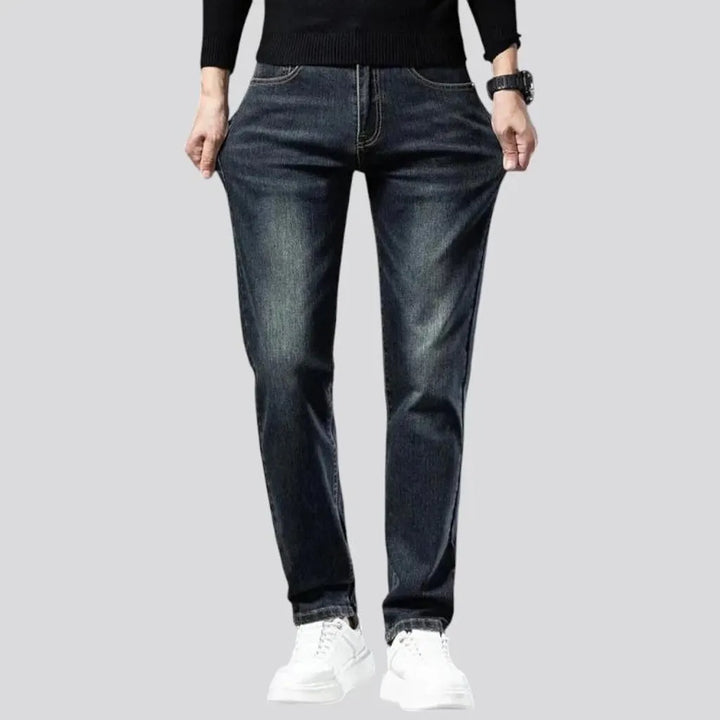 Stretchable dark fading jeans for men