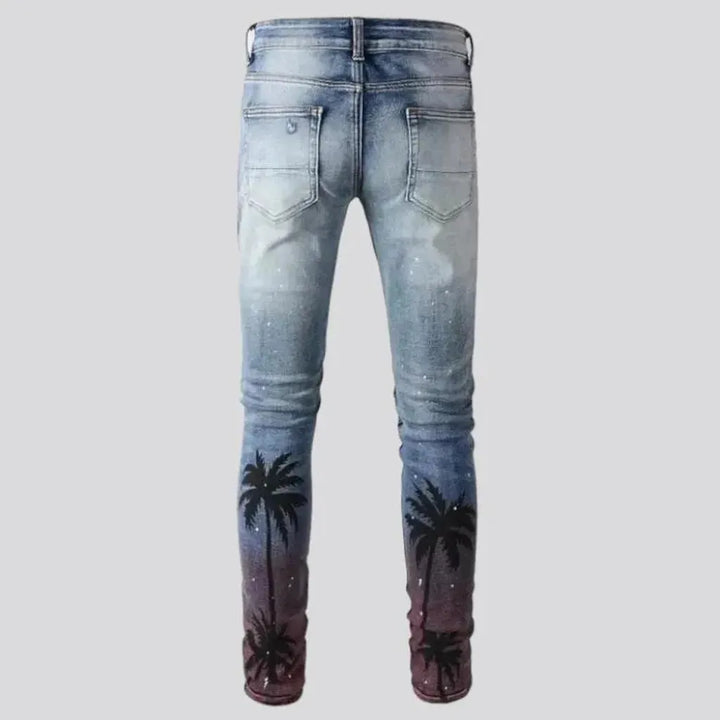 Distressed men's palms-print jeans