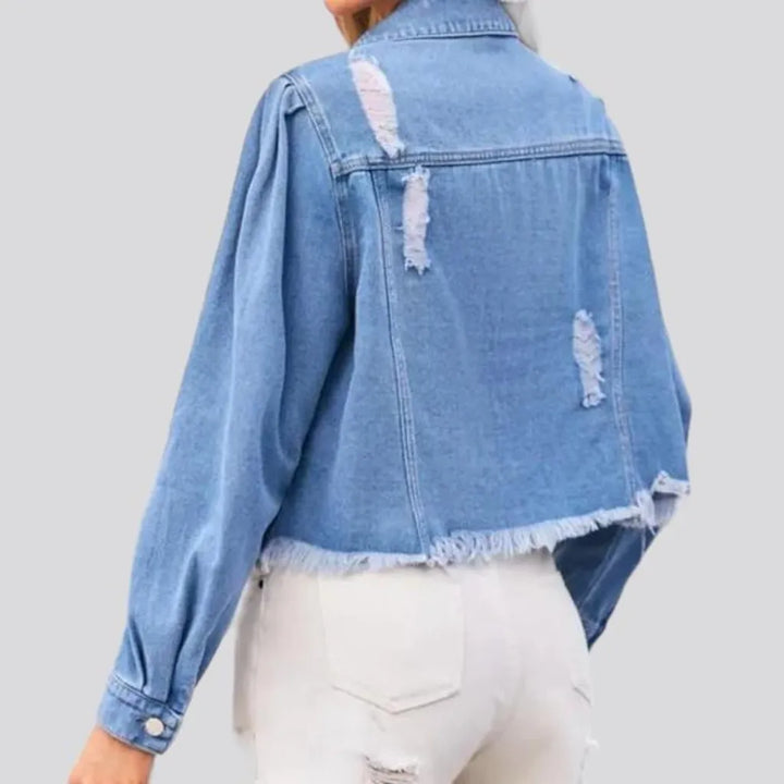 Light-wash distressed denim jacket