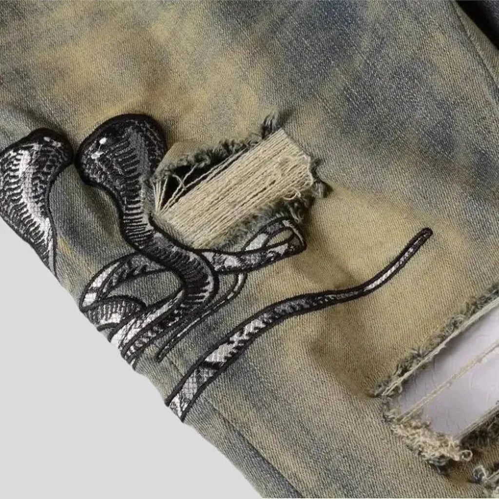 Mid-waist cobra-embroidery jeans