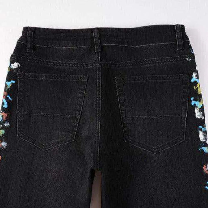 Multicolor stains painted men's jeans