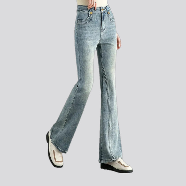 Fashionable mid-waist creased women's jeans