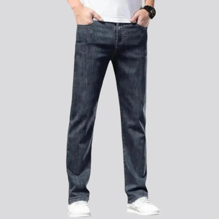 Whiskered men's mid-waist jeans