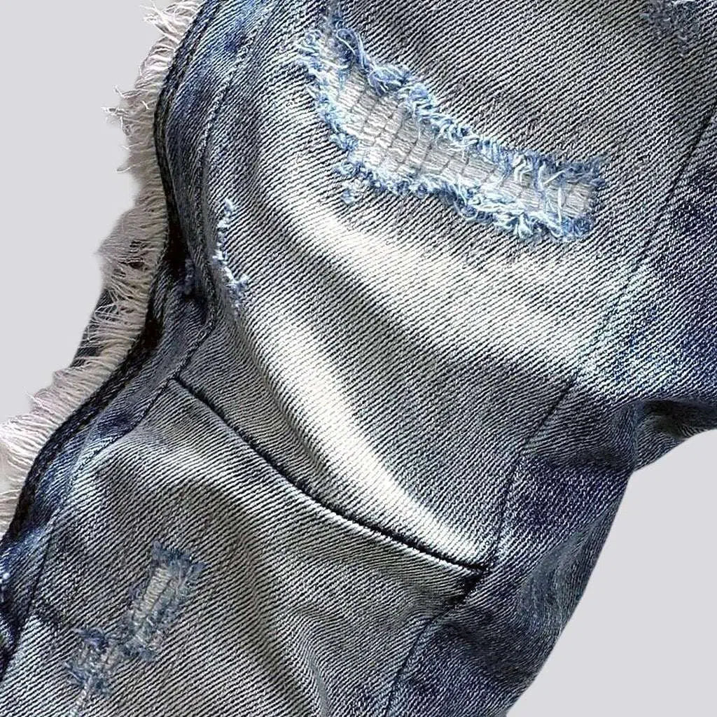 Distressed men's sanded jeans