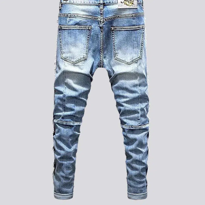 Distressed men's sanded jeans