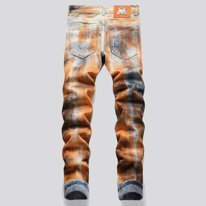 Light-wash men's painted jeans