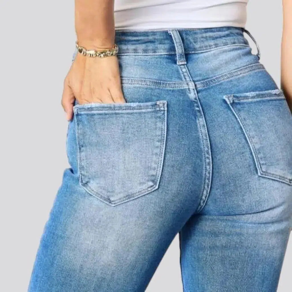 Light-wash sanded jeans
 for ladies