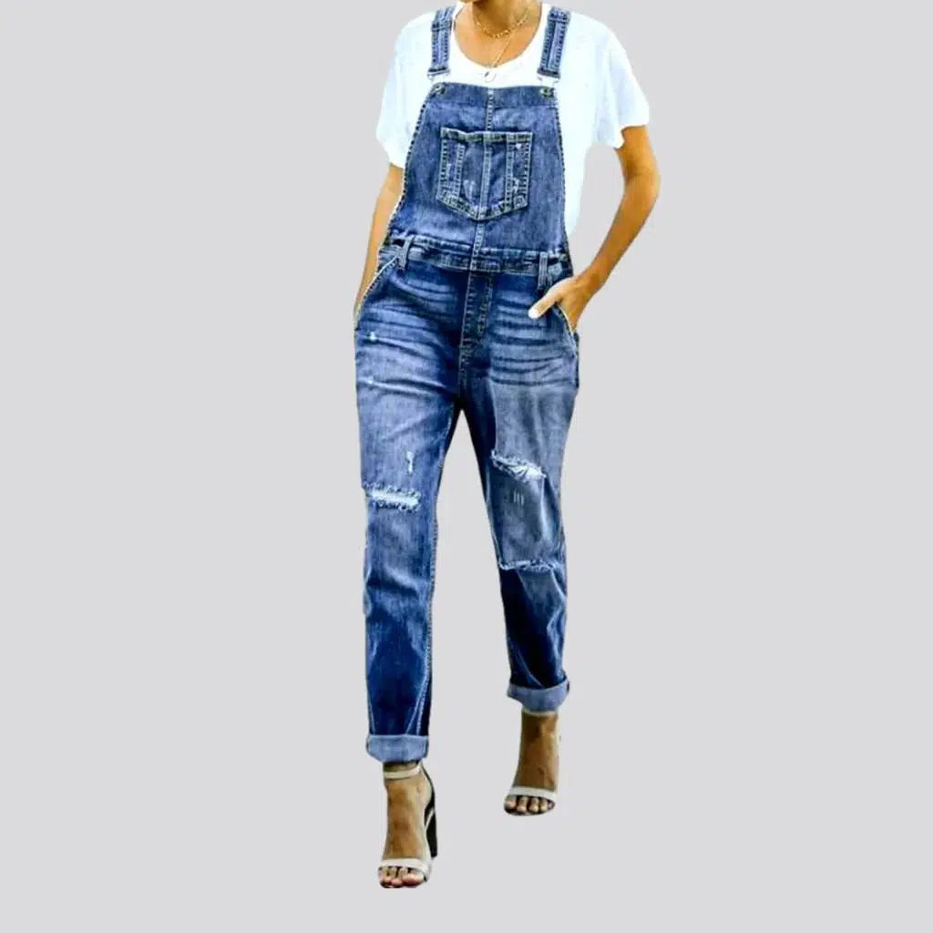 Distressed women's jeans overall