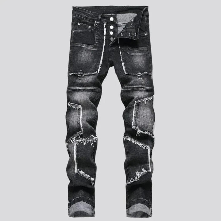 Damaged men's mid-waisted jeans