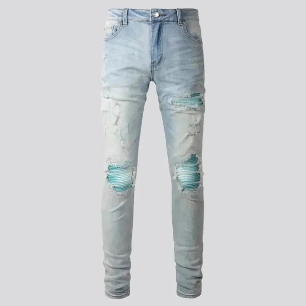 Grunge men's light-wash jeans