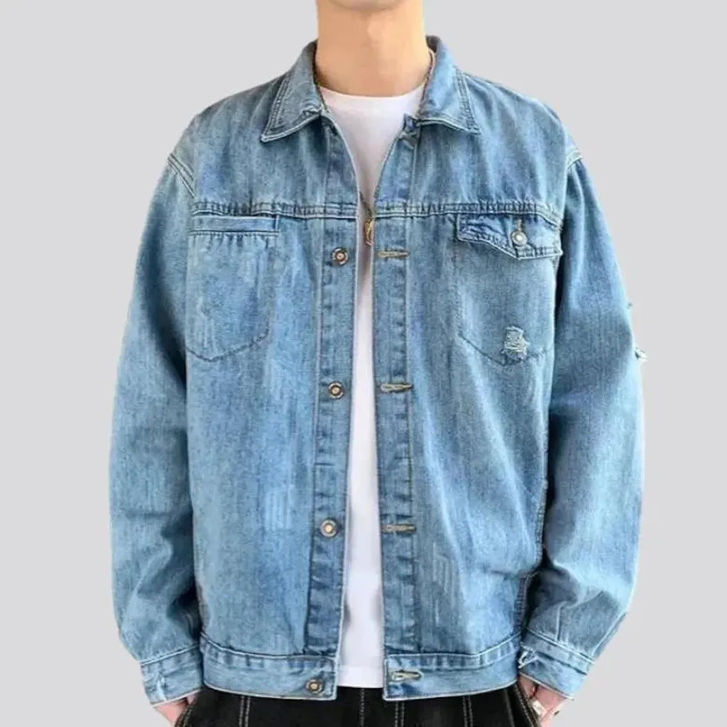 Light-wash distressed jeans jacket