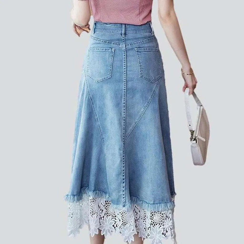 Denim skirt embroidered with lace